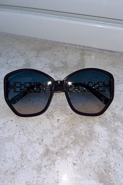 Bally Oversized Dark Sunglasses by Bally — pre-loved on Thrifted.mt