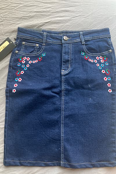 Embroidered denim midi skirt by Viny'l — pre-loved on Thrifted.mt