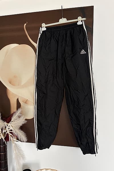 Adidas black track trousers by Adidas — pre-loved on Thrifted.mt
