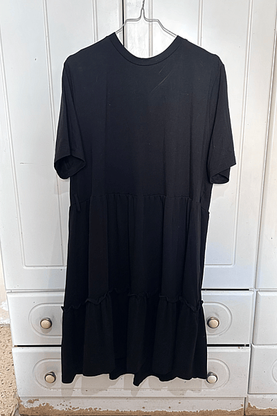 Black Tiered Smock Mini Dress by SHEIN — pre-loved on Thrifted.mt