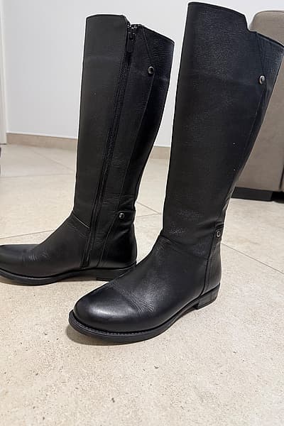Classic black real leather knee boots — pre-loved on Thrifted.mt